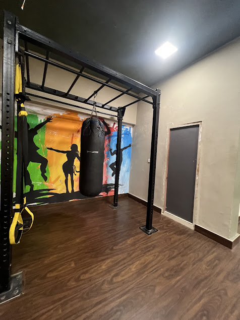 Dark Sweat Health Gym interior and training session view 4